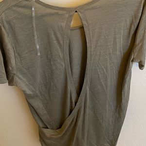 Green open back workout blouse